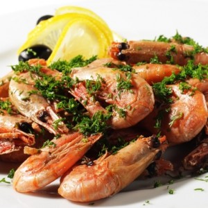 Shrimps Plate Served with Lemon and Olives