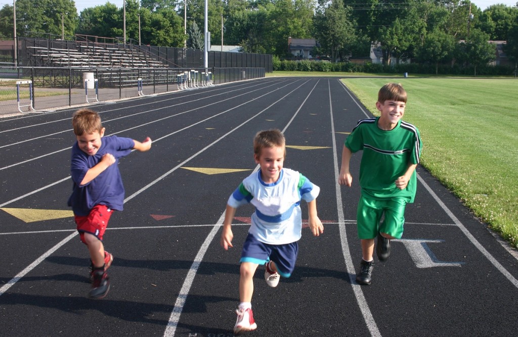 bigstockphoto_kids_running_on_track_7819021